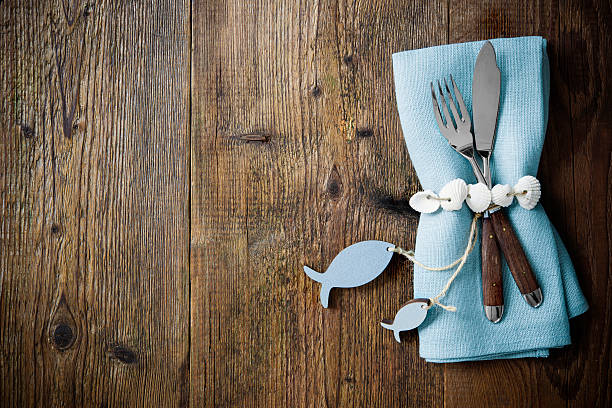 istock Fish cutlery tied with empty fish shaped tag 520491076
