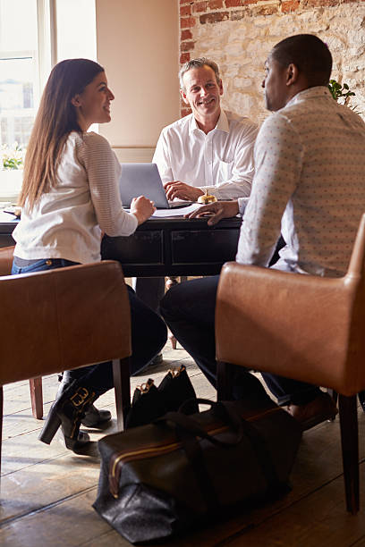 istock A multi ethnic couple couple checking in at a boutique hotel 520492164