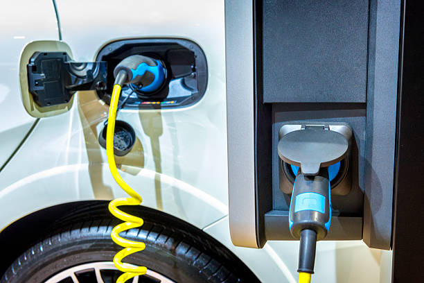 istock Electric plug-in hybrid car charging 520492566