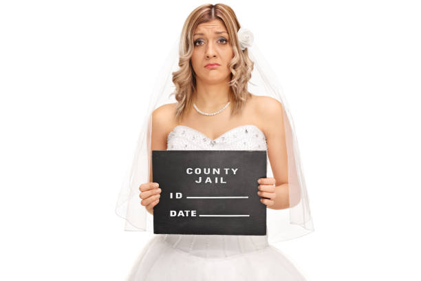 istock Sad young bride posing for a mug shot 520495898
