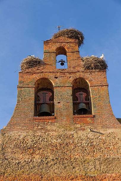 istock Church belfry Storks Nests - Sword with Stork Nests 520496488