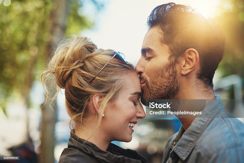 I am yours to keep Shot of a young couple out in the city Couple - Relationship Stock Photo