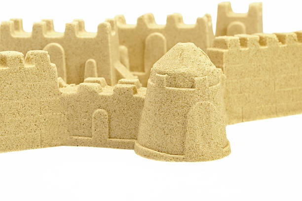 istock Sandcastle Wall And Towers Isolated On White Background 520499864