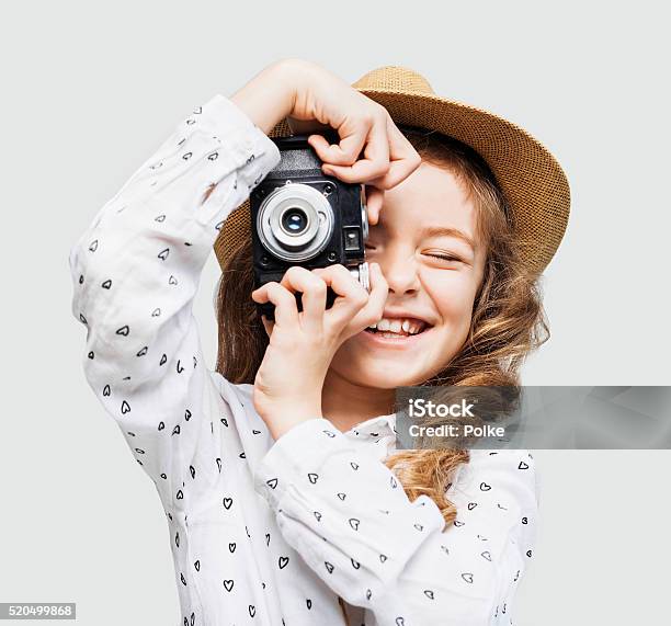 Young Photographer Looking At Camera Stock Photo - Download Image Now - Child, Camera - Photographic Equipment, Photographing