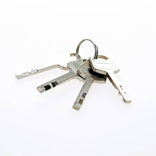 istock Bunch of keys isolated on white 520502910