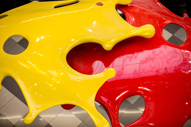 Abstract red and yellow paints frozen in motion