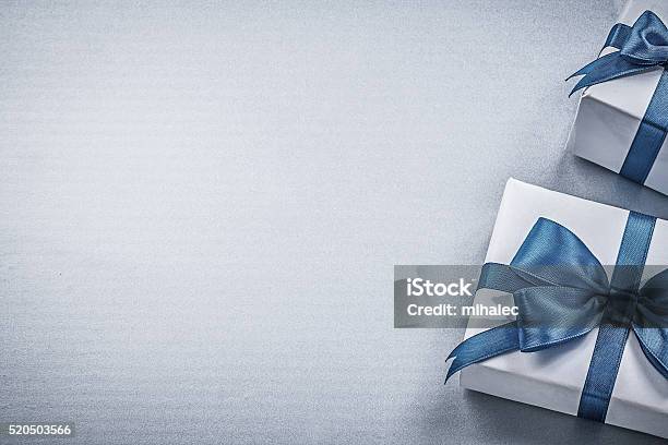 Present Boxes On Blue Background Greeting Card Holidays Concept Stock Photo - Download Image Now