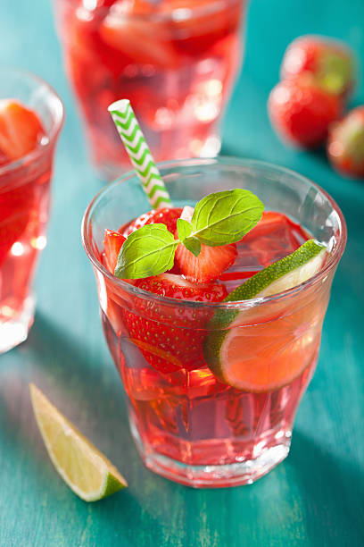 istock summer strawberry lemonade with lime and mint 520504356