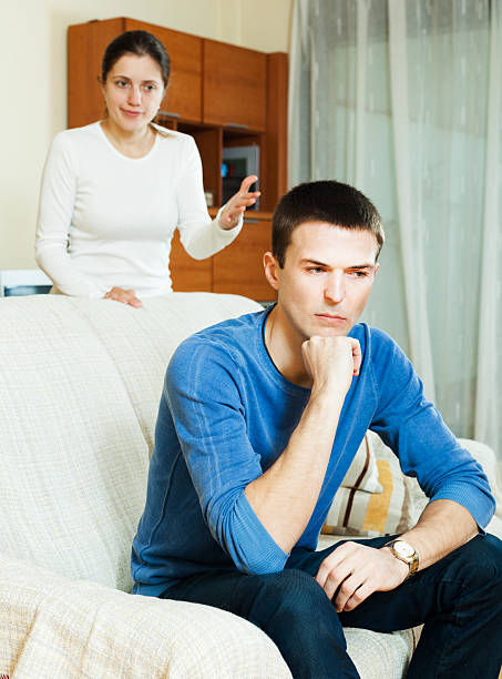 istock Unhappy man with aggressive wife 520508151