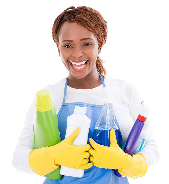 istock Woman with cleaning products 520509395