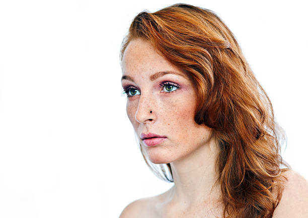 istock attractive girl with freckles 520509417