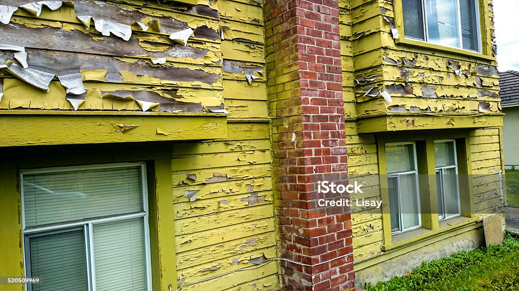 Need Paint A house sorely in need of some paint. Abandoned Stock Photo