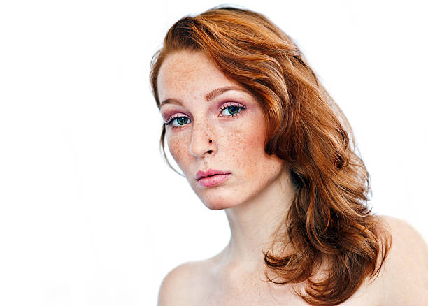 istock attractive girl with freckles 520510051