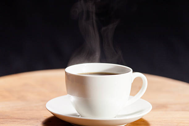 istock cup of hot coffee on a wooden table 520511177