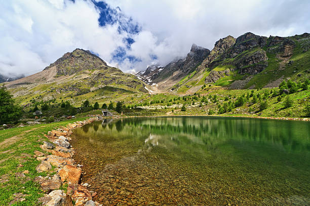 istock Trentino - Doss dei Gembri lake 520536283