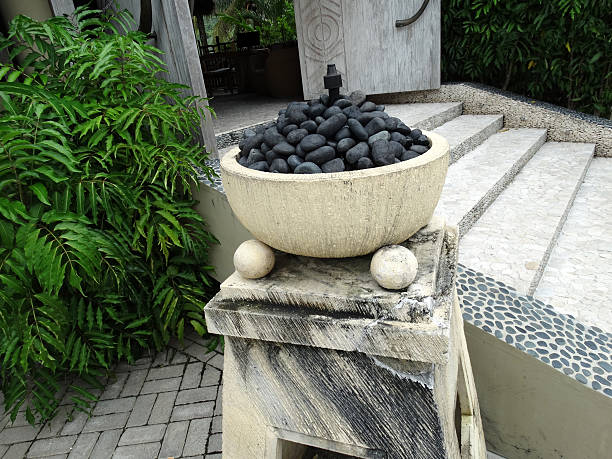 istock black stones in marble bowl 520536541