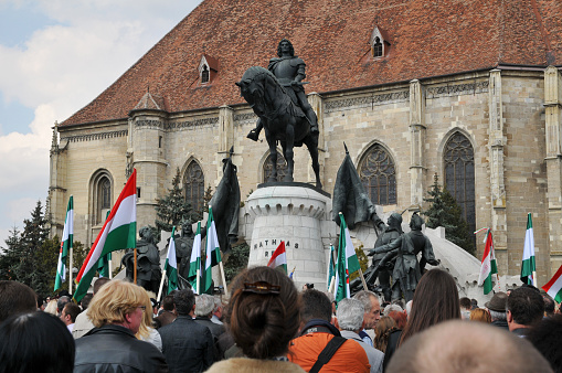 Cluj Napoca, Romania - April 2, 2011: The citizens of Cluj Napoca (Kolozsvar in Hungarian) participating at the uncovering of the newly renovated statue of King Mathias