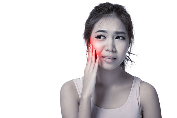 istock Pretty Asian girl has toothache 520539943