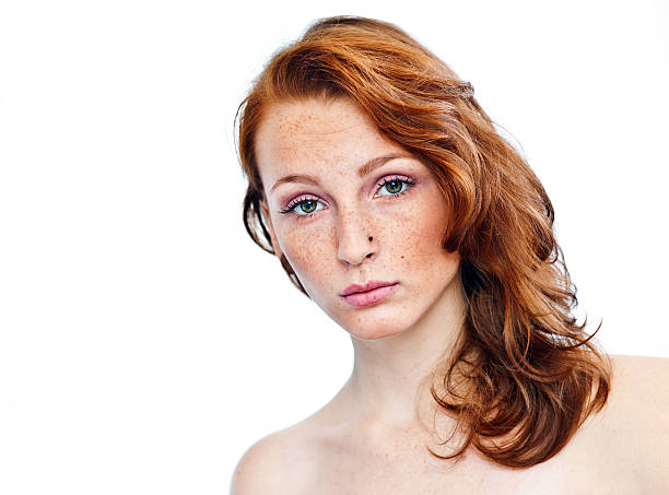 istock attractive girl with freckles 520539993
