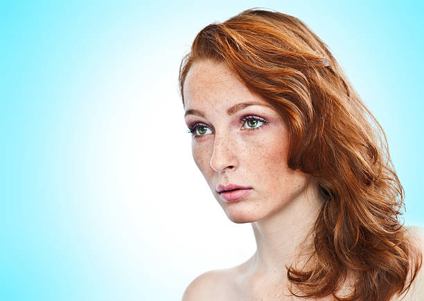 istock attractive girl with freckles 520540007