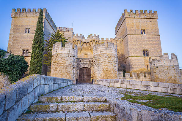 Ampudia, Spain - March 21, 2016: The Ampudia Castle is located in Castilla y Leon, Spain, close to the city of Valladolid. It is a medieval castle still keeping its interior and its high defensive walls.