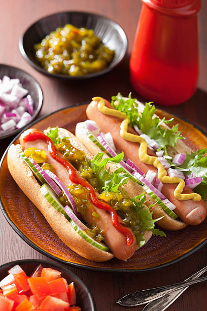 istock grilled hot dogs with vegetables ketchup mustard 520542110