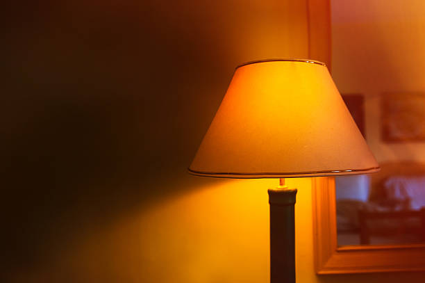 istock included a beautiful wall lamp in the room 520542484