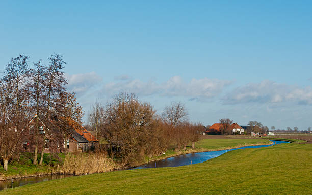 istock Meandering river in an autumnal landscape 520542591