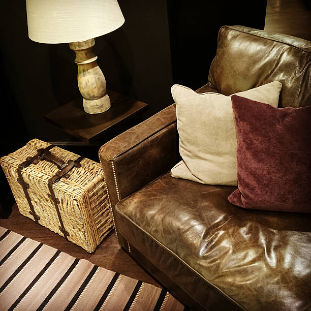 istock Leather sofa, lamp and rattan suitcase 520542639