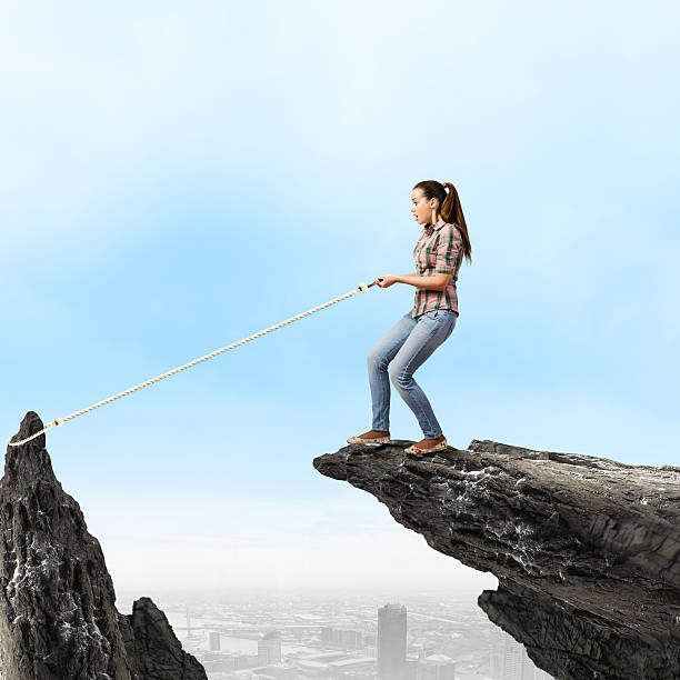 istock Woman on rock 520542709