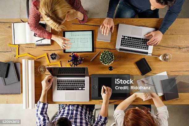 Architects At Work Stock Photo - Download Image Now - Desk, Architect, Small Office