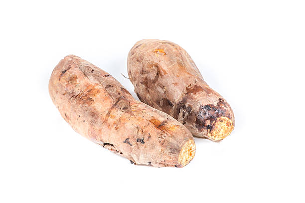 istock Sweet potatoes on the white background 520544642