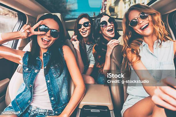 Just Fun And Road Ahead Stock Photo - Download Image Now - Car, Friendship, Women