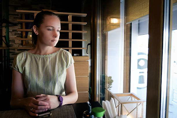 istock Woman sits at the table and waiting 520549422