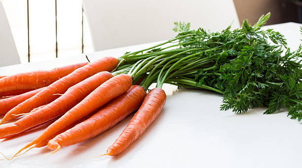 istock Bunch of organic fresh carrots 520551204