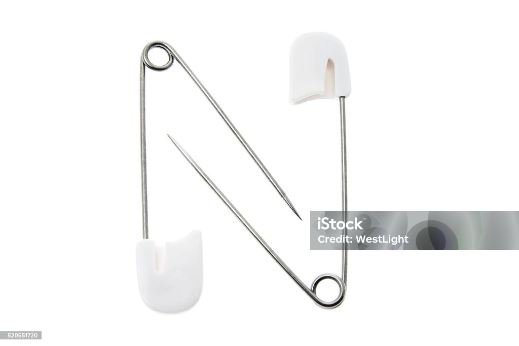 Safety Pins Safety Pins on Isolated White Background Cut Out Stock Photo