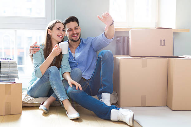 istock Couple in new home 520555696