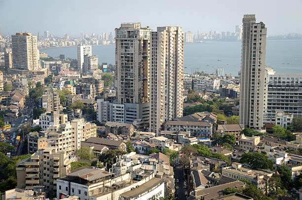 Aerial view of south Mumbai's skyline Aerial view of south Mumbai's skyline where old, heritage structures stand cheek by jowl with ultra modern skyscrapers and towers. The view covers and extends till luxurious Marine Drive, Nariman Point and Cuffe Parade with Arabian Sea in the distance arabian sea photos stock pictures, royalty-free photos & images