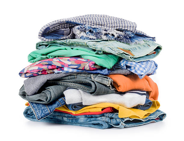 istock Pile of coloured clothes from the laundry 520564717