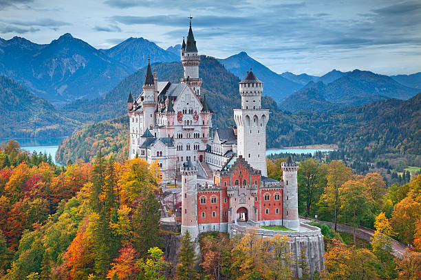 Neuschwanstein Castle, Germany. Hohenschwangau, Germany - October 7, 2014: view of Neuschwanstein Castle on october 7th near Hohenschwangau, Germany during autumn afternoon surrounded by fall colours. bavaria stock pictures, royalty-free photos & images