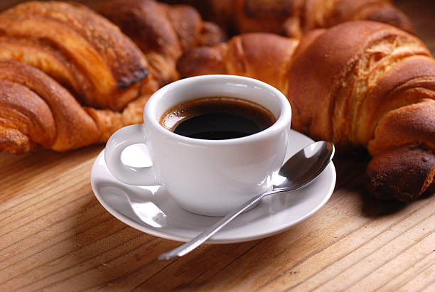 istock espresso and croissant 520566243
