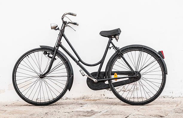 istock Vintage black bicycle - Stock Image 520568915