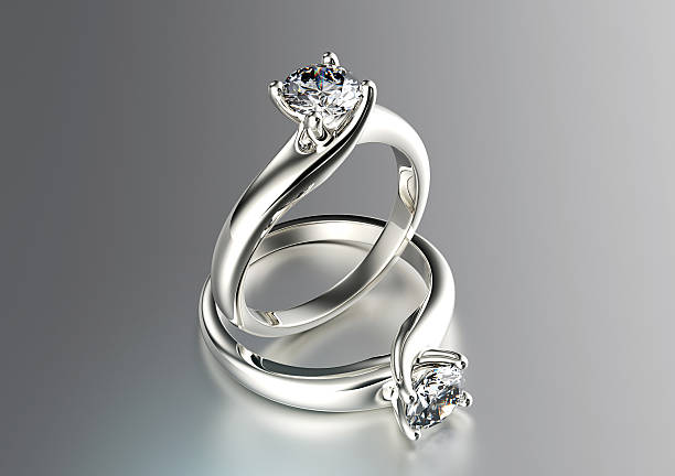 istock Golden Engagement Ring with Diamond. Jewelry background 520569695