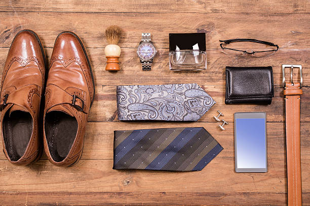 istock Men's accessories organized on table.  No people.  Knolling. 520580864