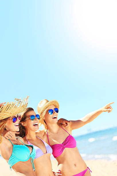 istock Group of women having fun on the beach 520581550