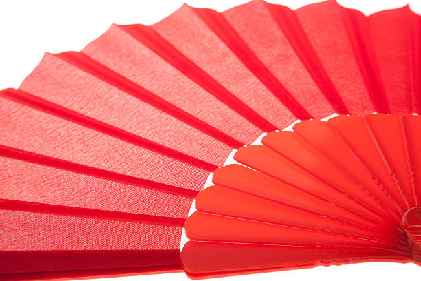 istock Close up Red Open Hand Fan, Isolated on a White 520581726