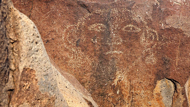 istock Face Petroglyph at Three Rivers Petroglyph site in New Mexico 520583294