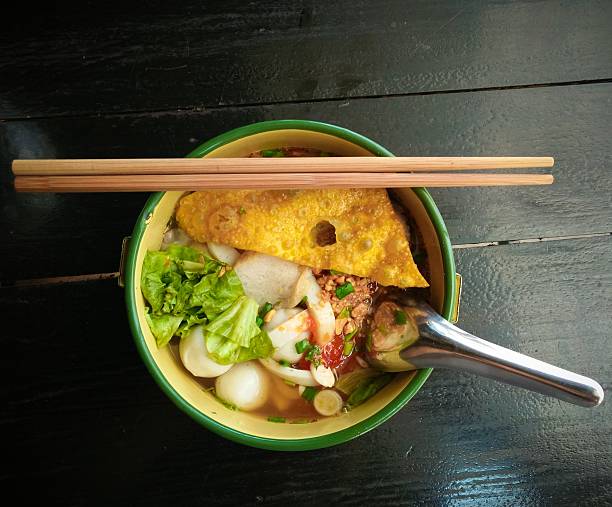 Noodles with fish balls in bowl