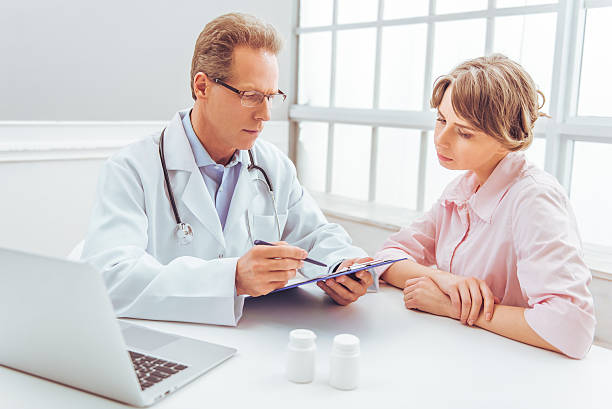 istock Woman at doctor 520584800