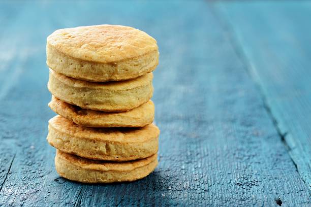 istock Tasty round homemade cookies on deep blue background 520585204